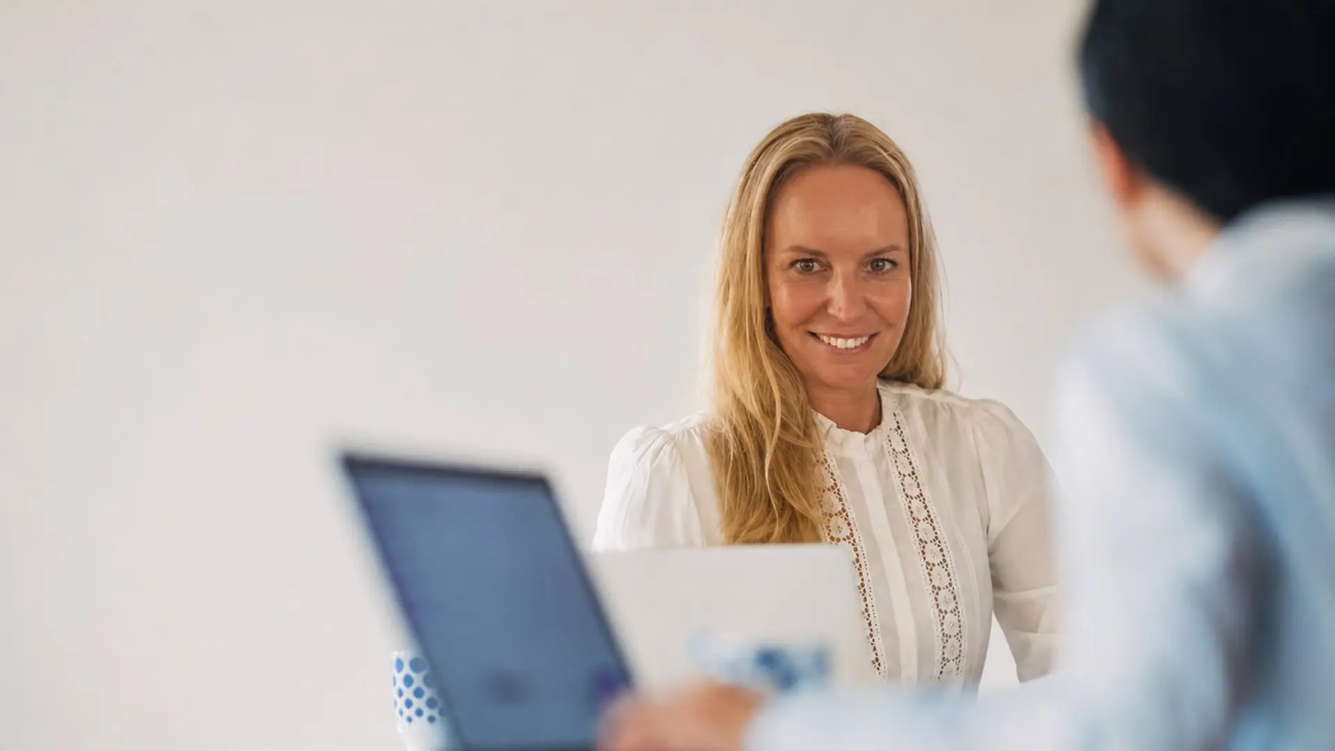 Portrait of Catherine Firmin, Eltek’s new Head of Marketing & Commercial Development, on a deep navy background