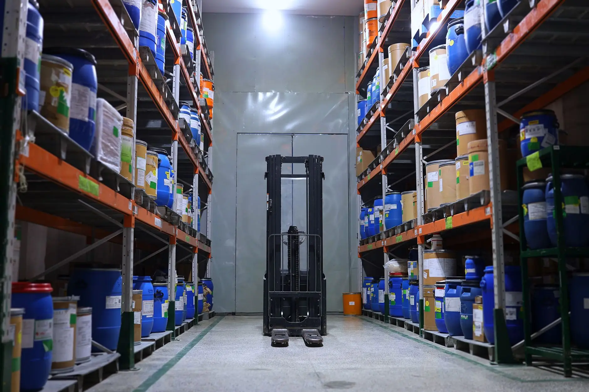 Racked pharmaceutical stock in a temperature-controlled storage facility, the kind of cold-chain storage Eltek monitors continuously and maps before use to EU GDP expectations