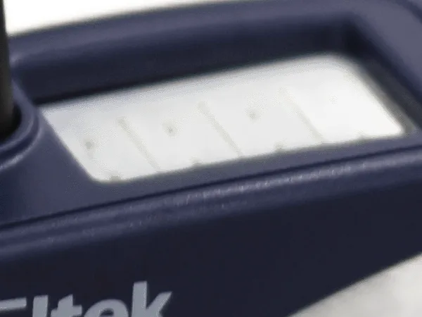 Close detail of the Eltek GD24 white four-way input socket block in the recessed top-panel well, where each of the four K-type or T-type thermocouples or state inputs connects