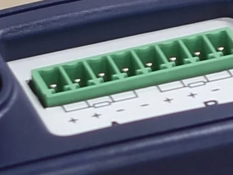 Close detail of the Eltek GD52A green eight-way screw-terminal block for wiring two 4-wire RTD temperature probes