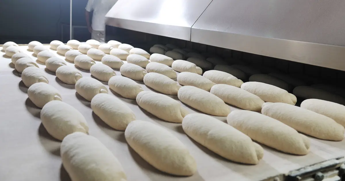 A clean, well-lit food production line where Eltek monitors conditions to protect quality and reduce downtime, from the factory floor to the cloud