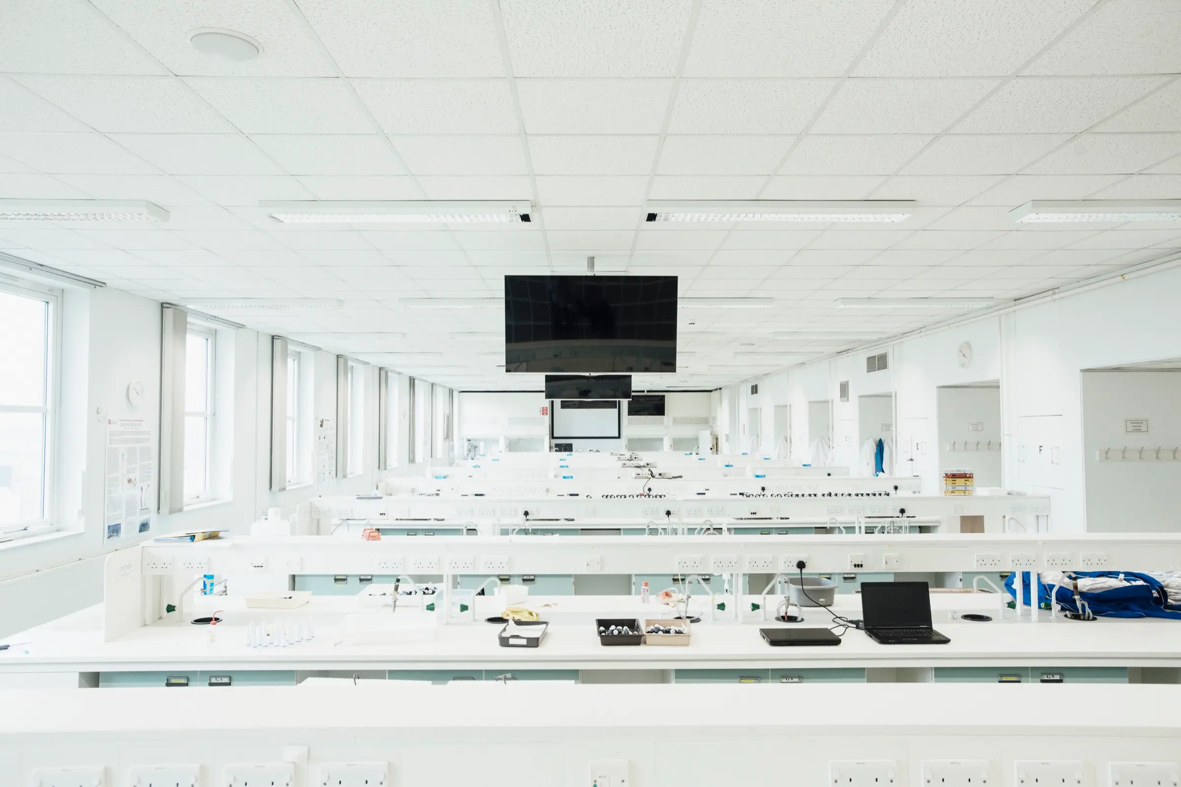 A modern laboratory bench with instrumentation, the kind of controlled biotech environment Eltek monitors for temperature, humidity and cryogenic storage